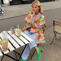 Damenjacke mit Blumenmuster, lockerer Passform und farbenfrohem Design - 1 - Jasminaboutique.com