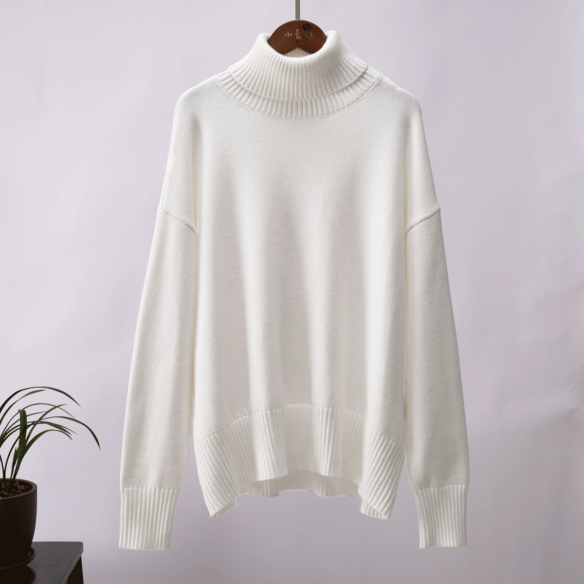 Damenpullover in lockerer Passform mit Rollkragen und langen Ärmeln - 3 - Jasminaboutique.com