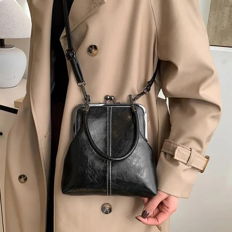 Damenhandtasche mit elegantem Rahmen und strukturiertem Design | J&B